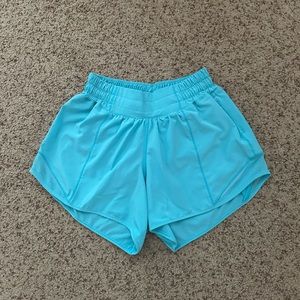 Lululemon RARE 2022 Color! Hotty Hot
Low- Rise Lined
Short 4" Electric Turquoise